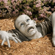 Illustration for article titled Zombie Garden Sculpture Keeps Those Damn Kids Off Your Lawn, Might Eat Their Brains